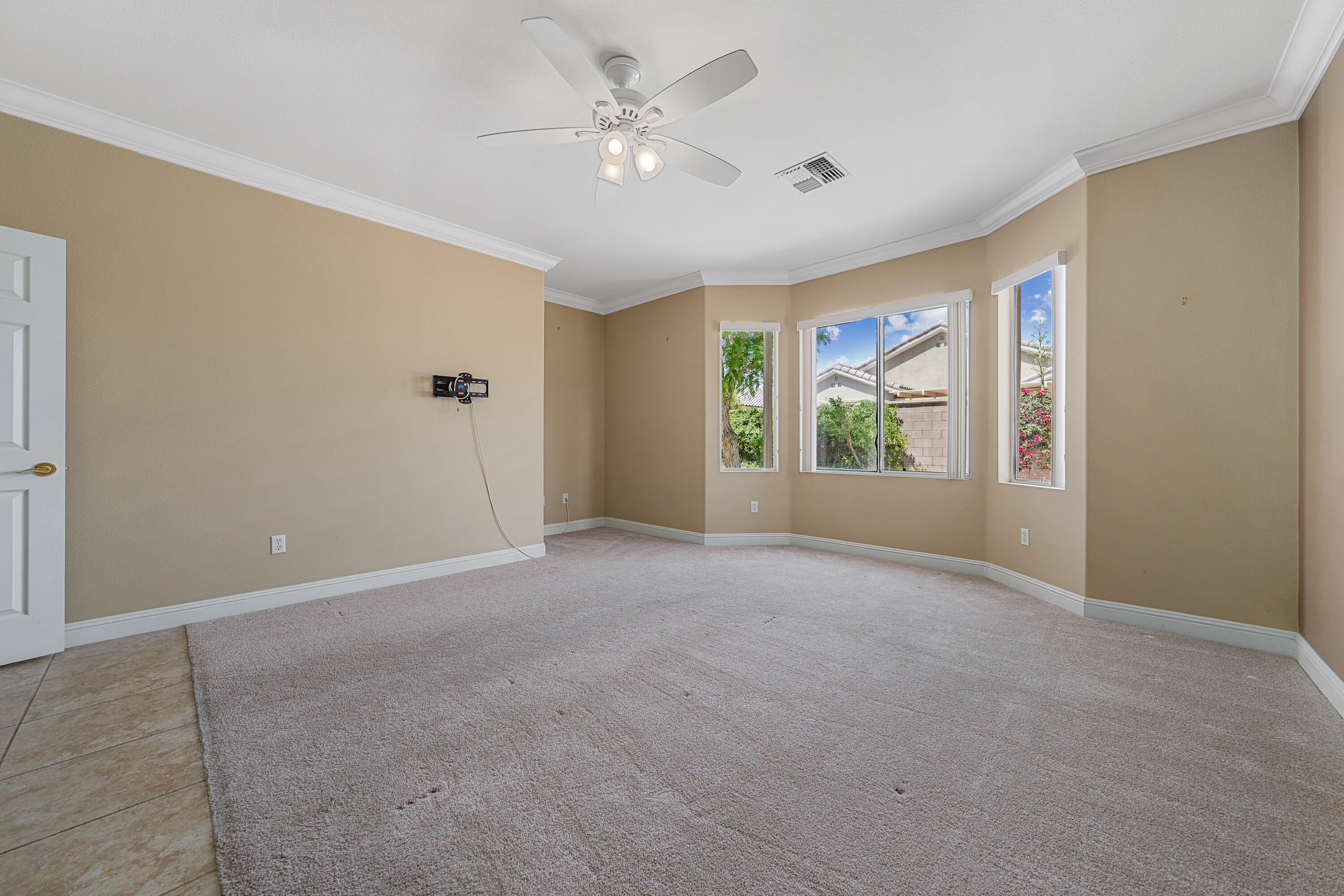 36403 Monarch Pass Palm Desert, CA 92211 - Photo 23 of 32 a view of an empty room with a window