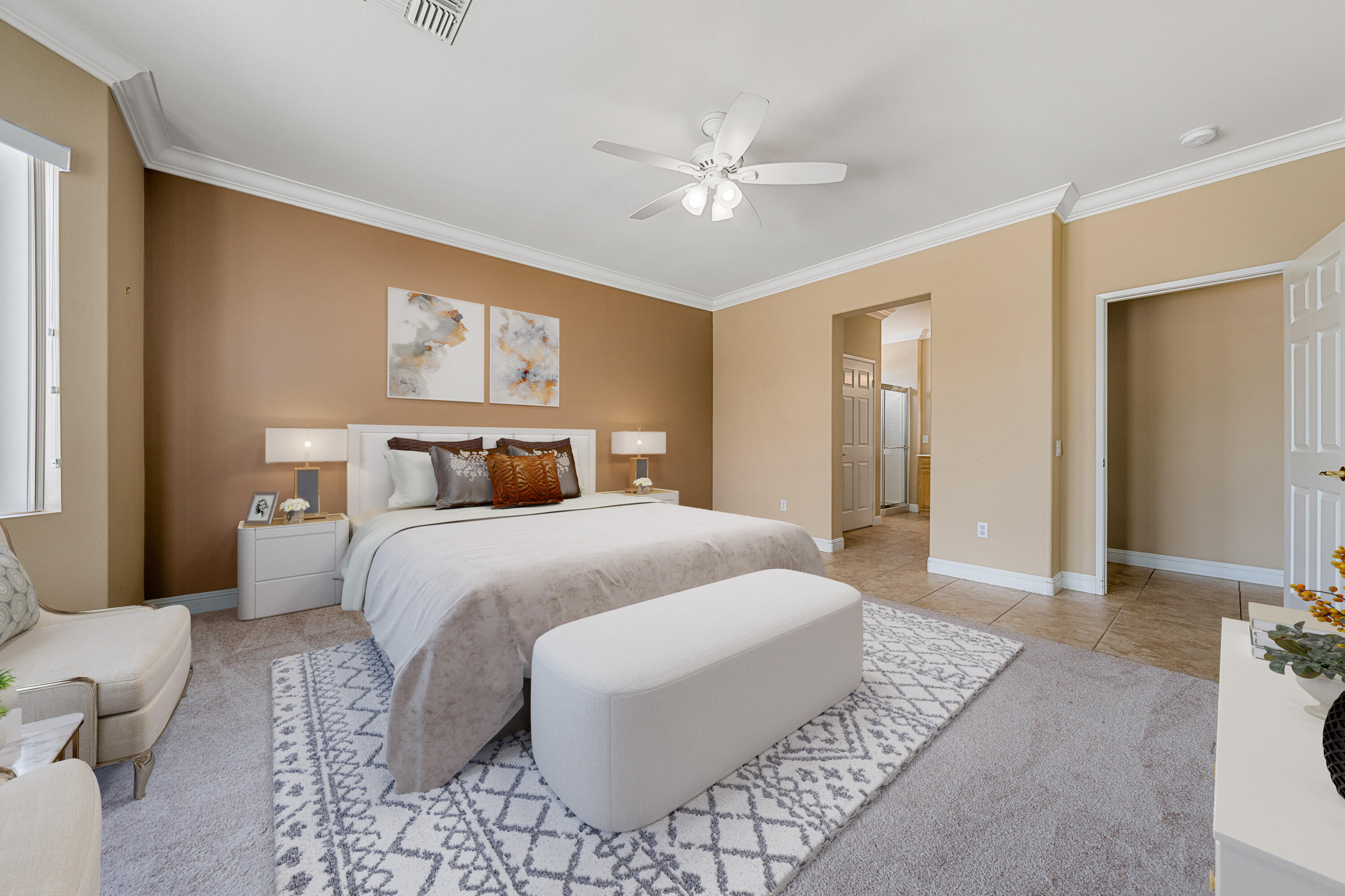 36403 Monarch Pass Palm Desert, CA 92211 - Photo 24 of 32 a bedroom with a large bed and a chandelier