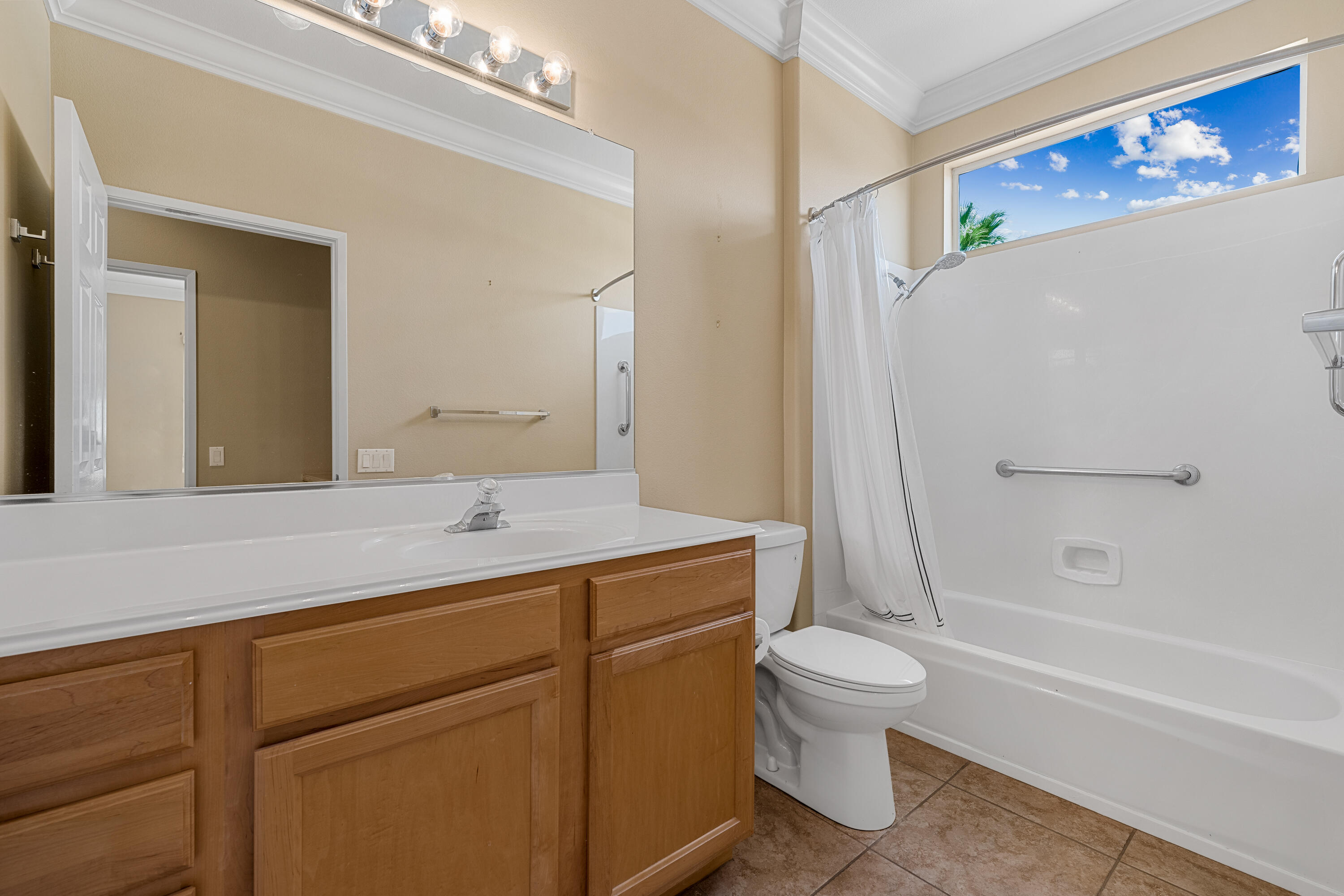 36403 Monarch Pass Palm Desert, CA 92211 - Photo 30 of 32 a bathroom with a granite countertop sink toilet and shower