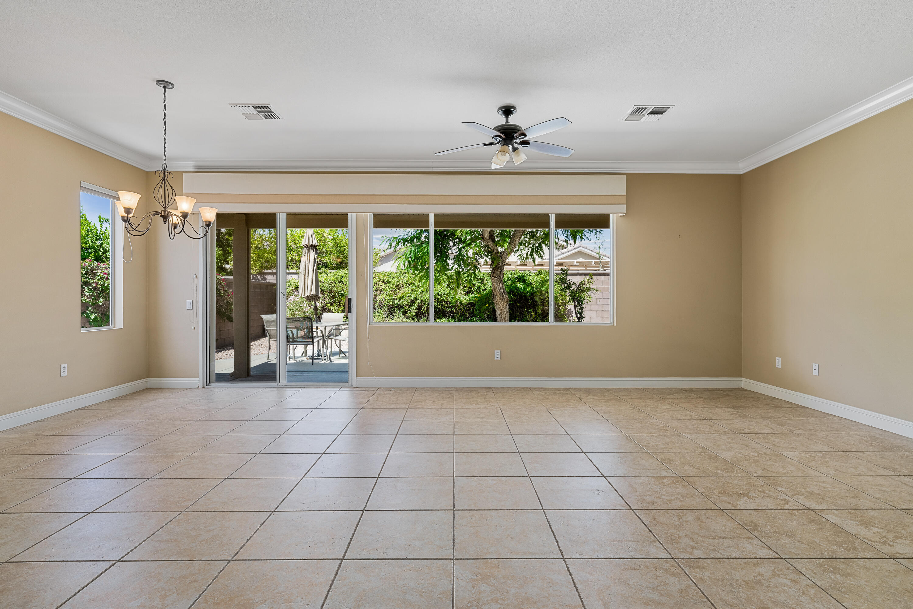 36403 Monarch Pass Palm Desert, CA 92211 - Photo 10 of 32 a view of an empty room with a window