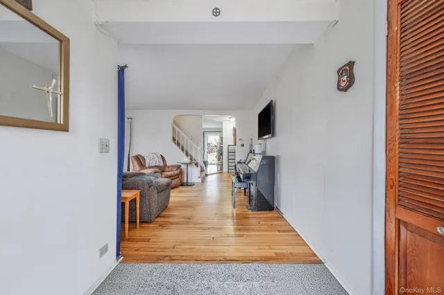 a view of a living room and dining room