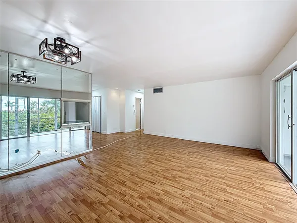 a view of a living room and a large window