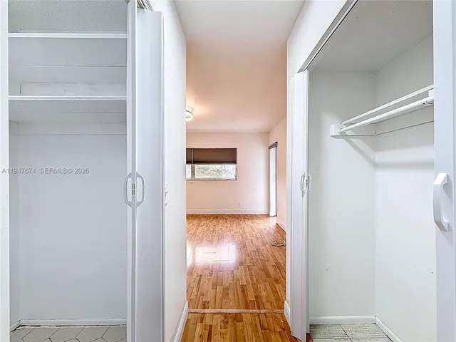 a bathroom with a sink a toilet and bathtub