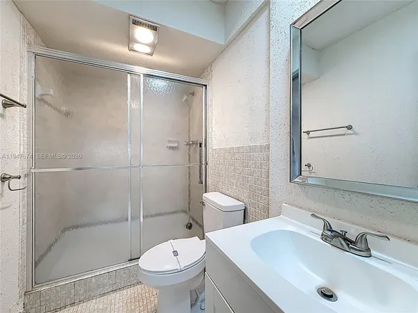 a view of a room with a large window