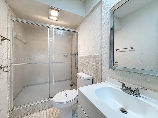 a view of a room with a large window