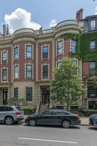 a car parked in front of a building