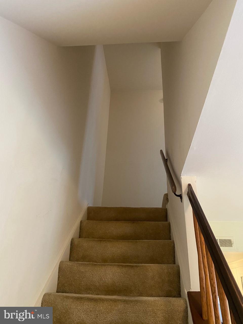 9563 Transfer Row Columbia, MD 21045 - Photo 12 of 18 Stairs, Carpet on upper level