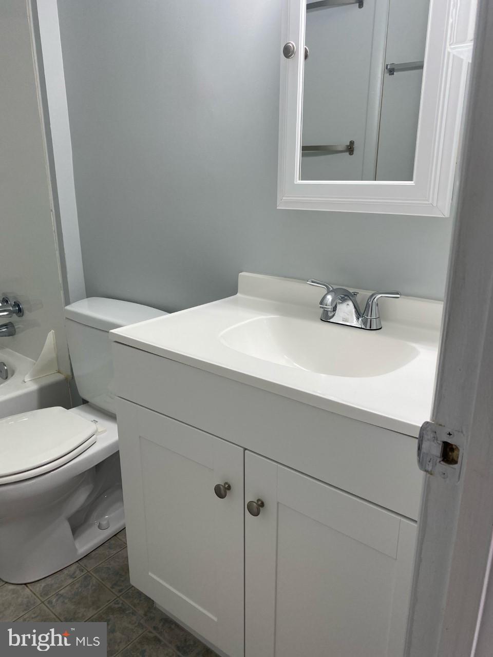 9563 Transfer Row Columbia, MD 21045 - Photo 13 of 18 Jack & Jill Bath off Master bedroom. Ceramic title