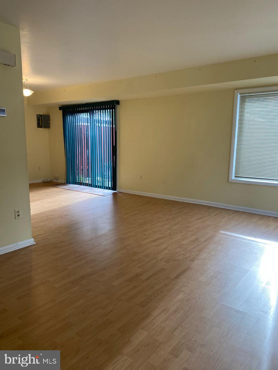 9563 Transfer Row Columbia, MD 21045 - Photo 5 of 18 Combo living and dining, with Laminate flooring