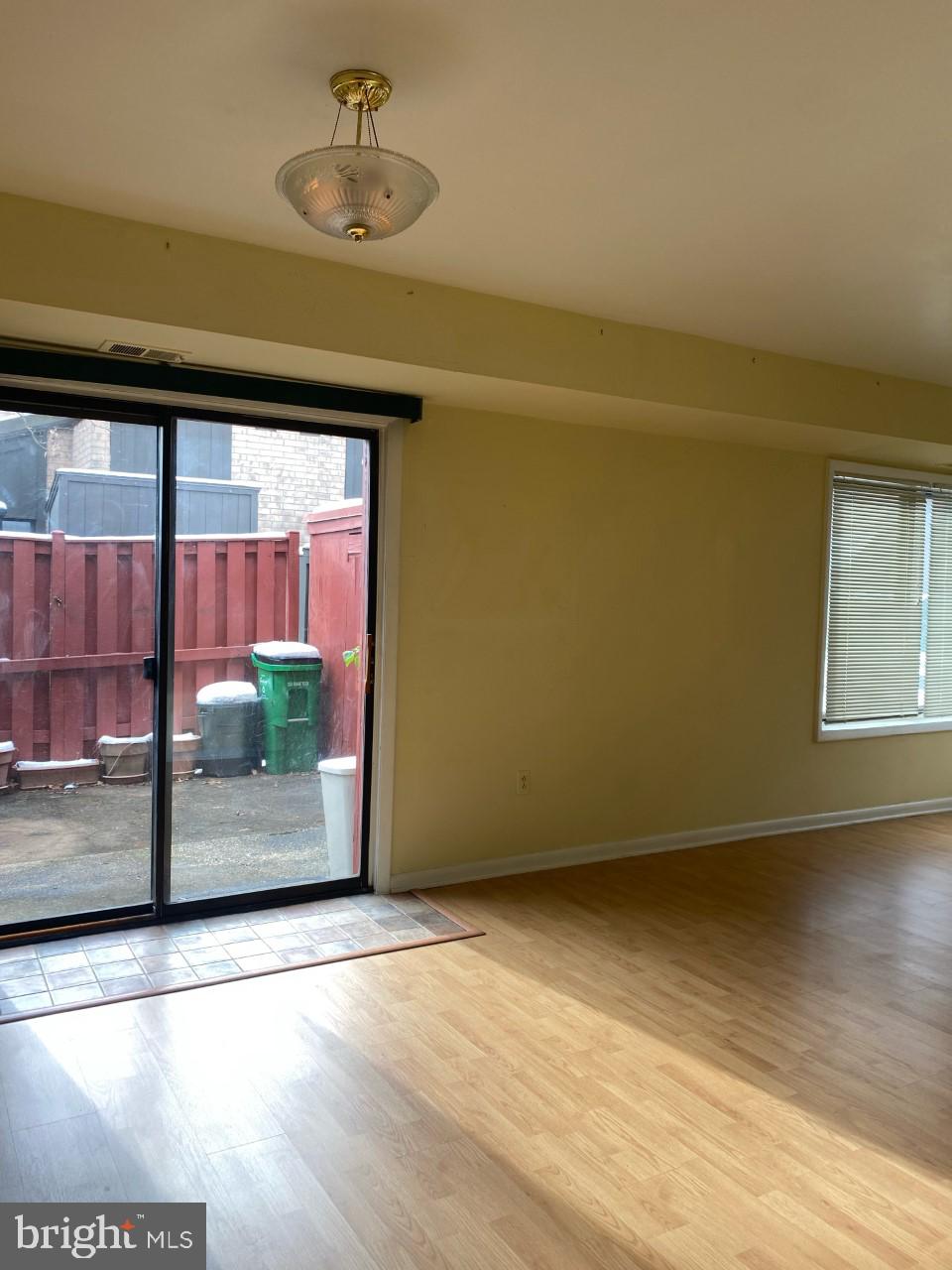 9563 Transfer Row Columbia, MD 21045 - Photo 7 of 18 Sliders to patio and fenced area