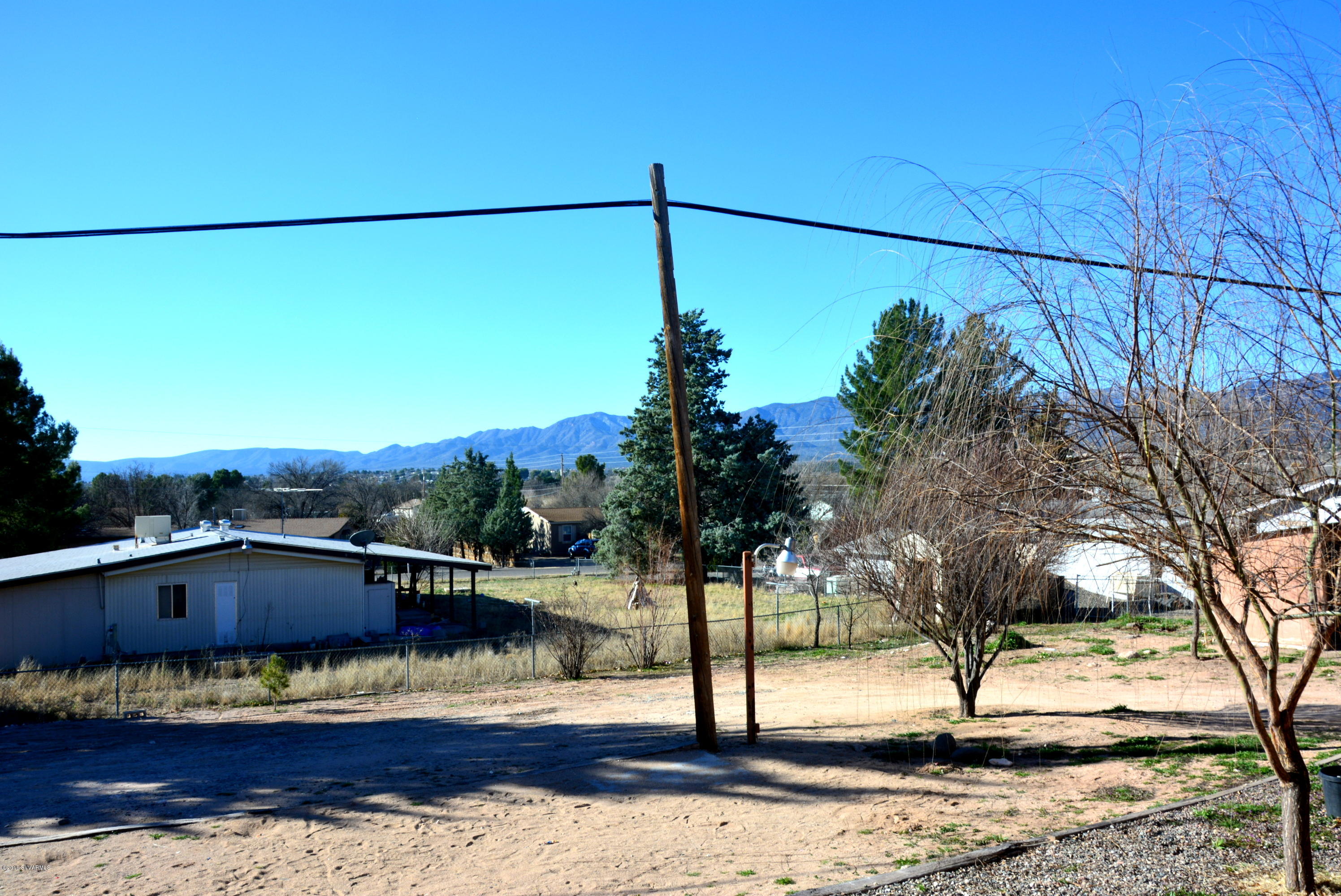 4050 Bridle Path Road Cottonwood, AZ 86326 - Photo 14 of 17 a view of a swimming pool with a patio