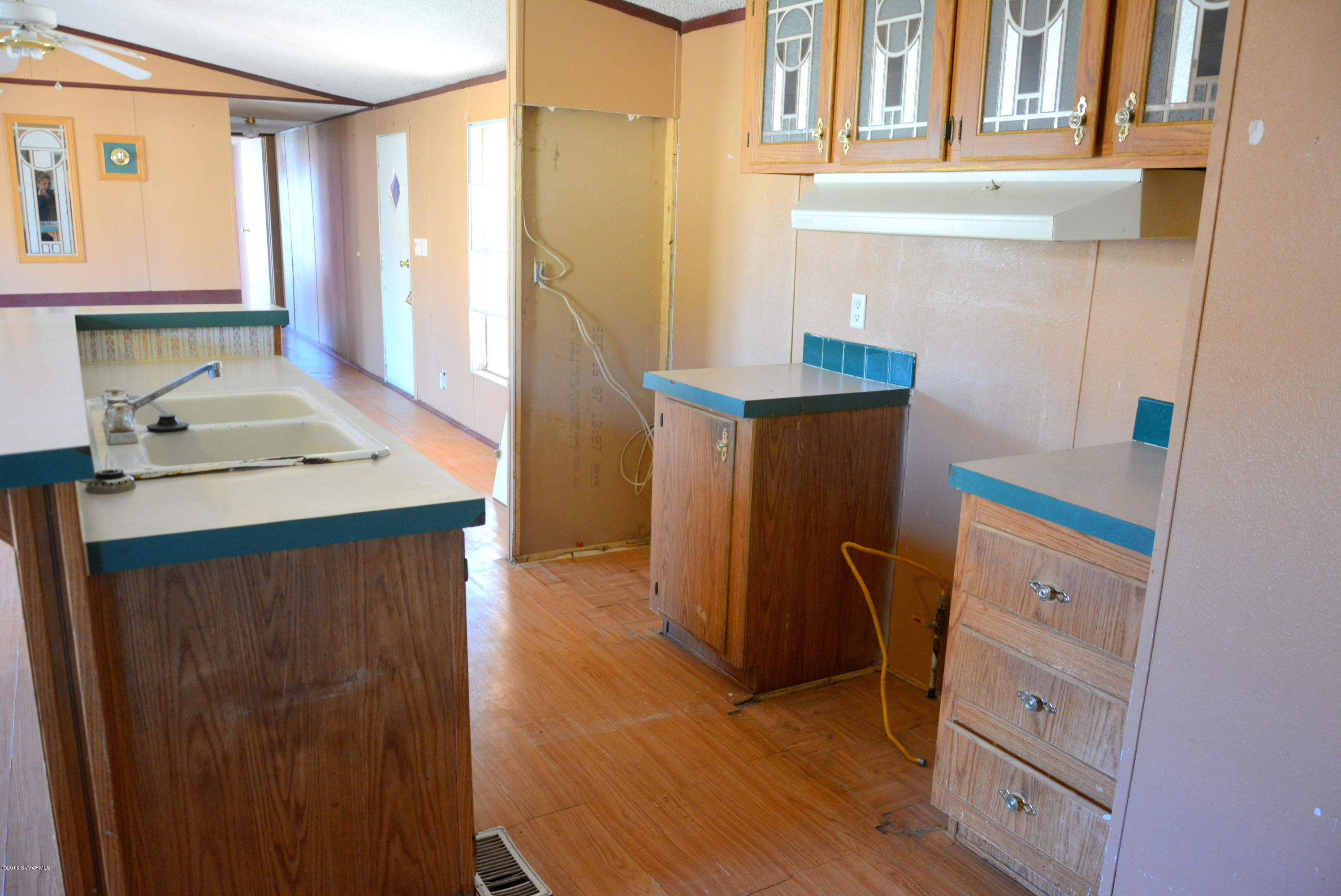 4050 Bridle Path Road Cottonwood, AZ 86326 - Photo 6 of 17 a view of kitchen with washer and dryer