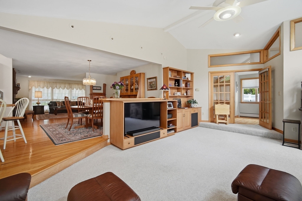 30 Birch Hill Road Northampton, MA 01062 - Photo 16 of 42 a living room with furniture and a flat screen tv