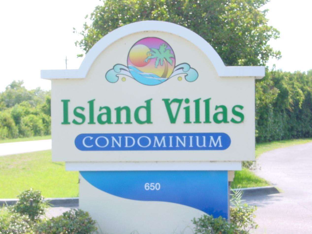 650 West Pope Road, Unit 252 St. Augustine, FL 32080 - Photo 1 of 33 a sign that is on a brick wall