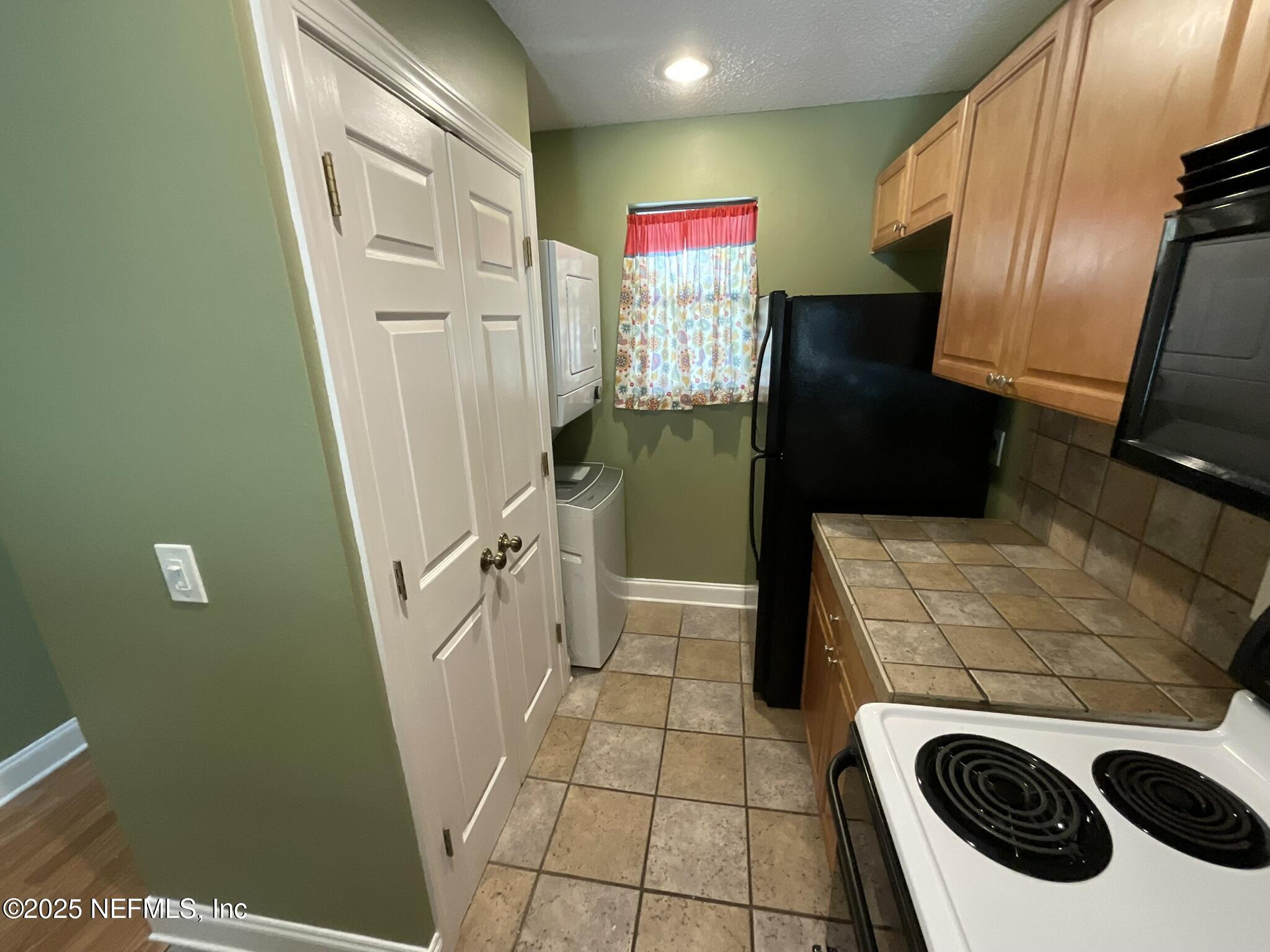 650 West Pope Road, Unit 252 St. Augustine, FL 32080 - Photo 11 of 33 a bathroom with a sink a toilet and a shower