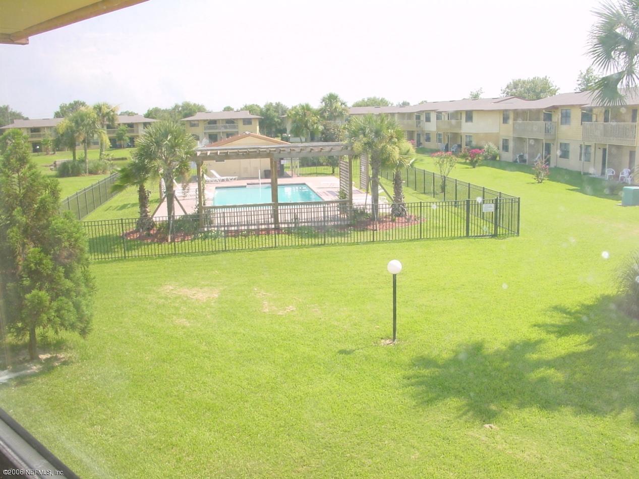 650 West Pope Road, Unit 252 St. Augustine, FL 32080 - Photo 22 of 33 a view of a swimming pool with an ocean view