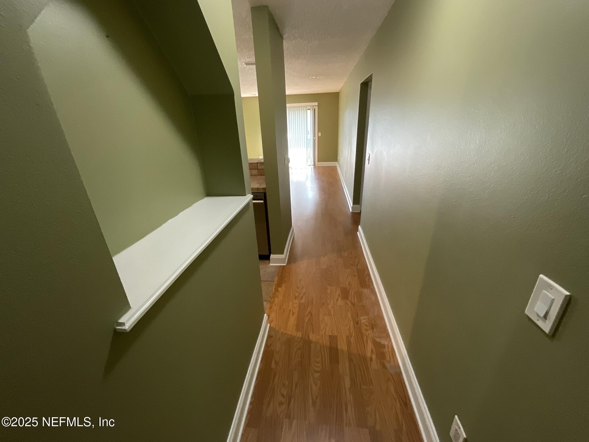 650 West Pope Road, Unit 252 St. Augustine, FL 32080 - Photo 23 of 33 a view of balcony with wooden floor