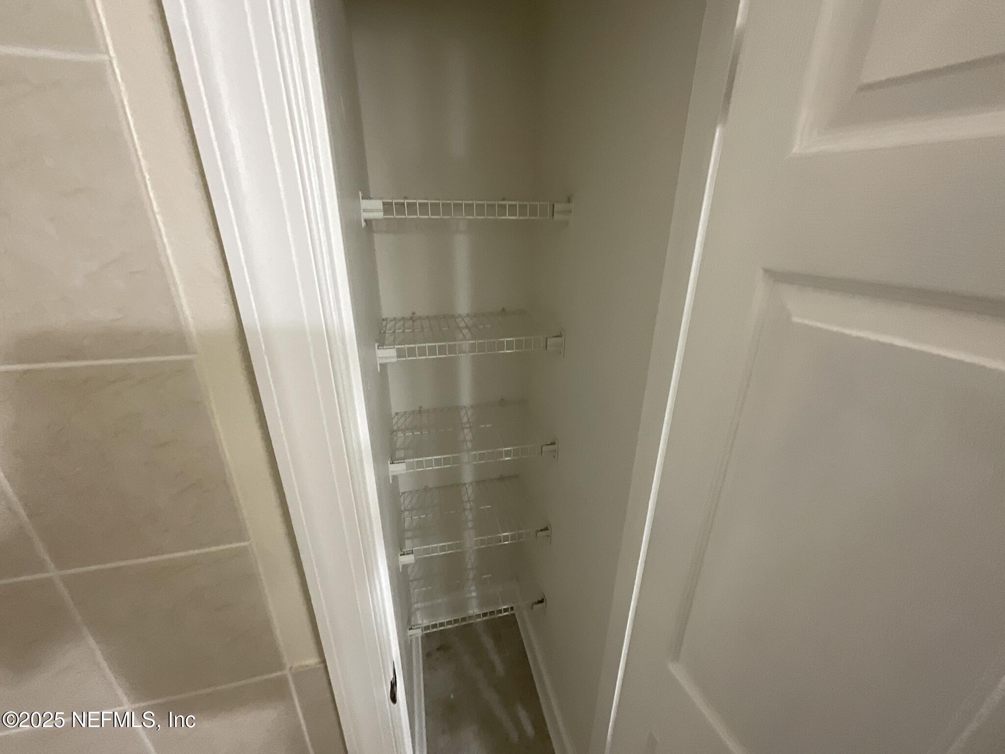 650 West Pope Road, Unit 252 St. Augustine, FL 32080 - Photo 32 of 33 a bathroom with a glass door shower