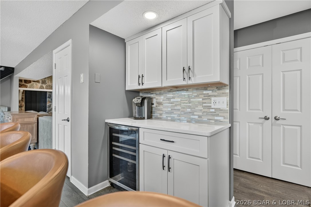 26427 Lake Front Road Rocky Mount, MO 65072 - Photo 14 of 69 Beverage/coffee bar, Beverage refrigerator along s