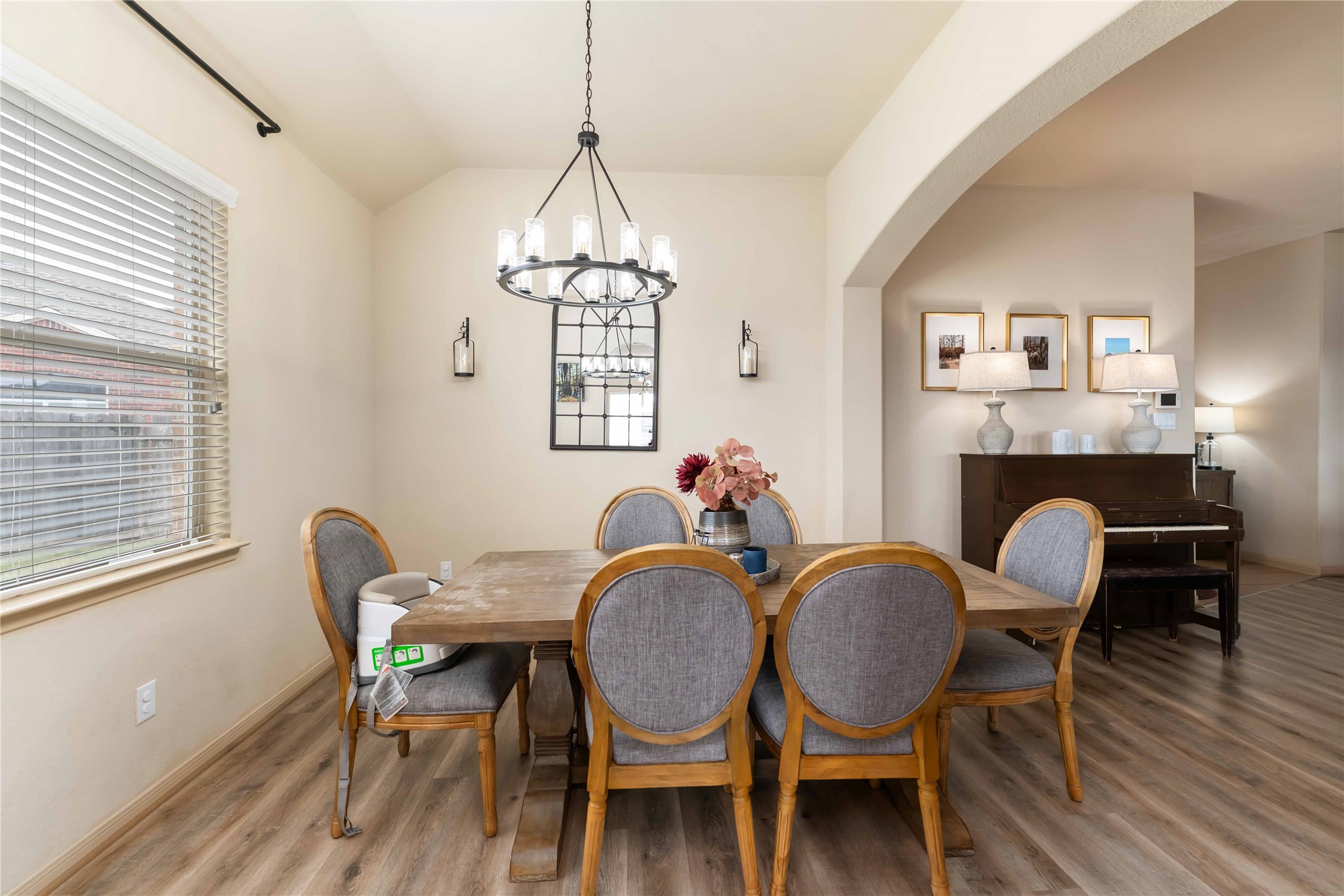 2502 Tiger Eye Drive Rosharon, TX 77583 - Photo 20 of 29 This dining area features a cozy atmosphere with a modern chandelier.