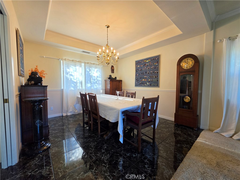 11541 Donovan Road Rossmoor, CA 90720 - Photo 42 of 113 Formal dining room with coffered ceilings