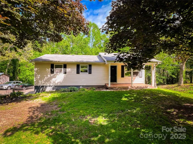 a view of a house with a swimming pool