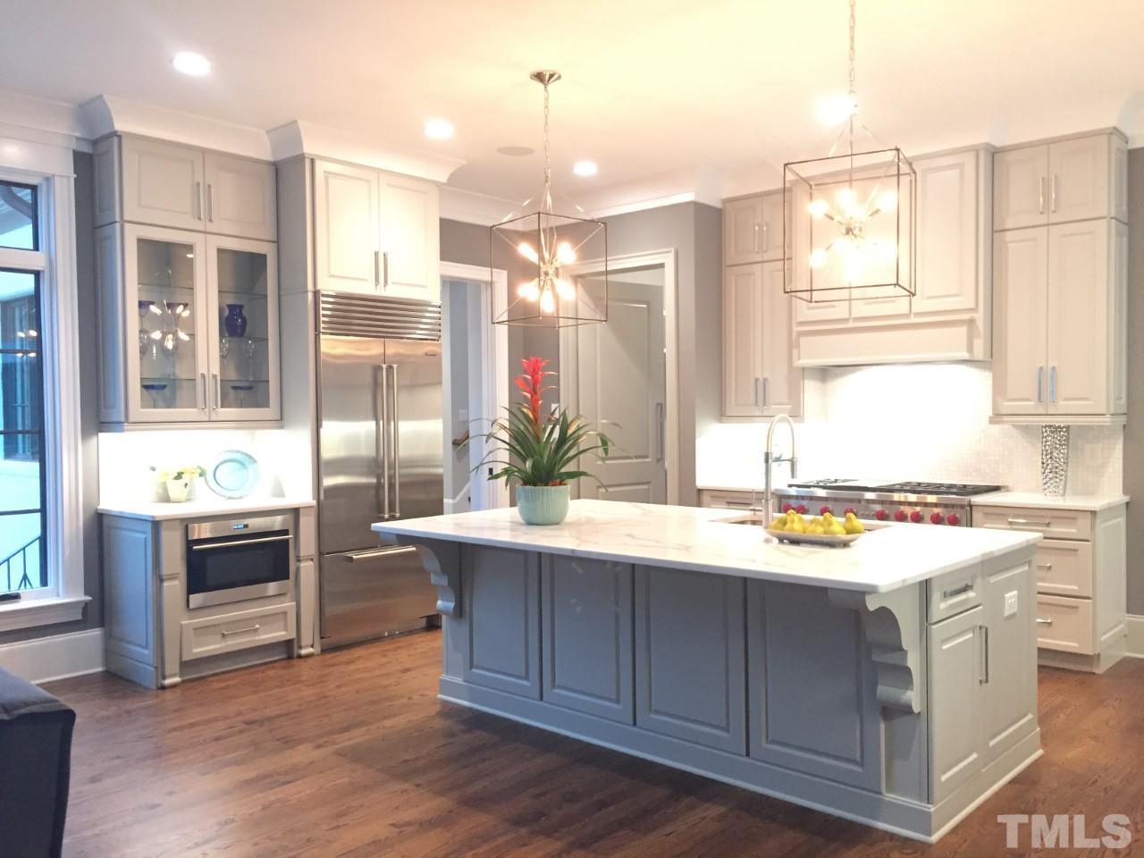 1024 Welch Lane Raleigh, NC 27614 - Photo 6 of 24 You Will Love Gathering In This Kitchen With Open View To The Pool And Family Room.