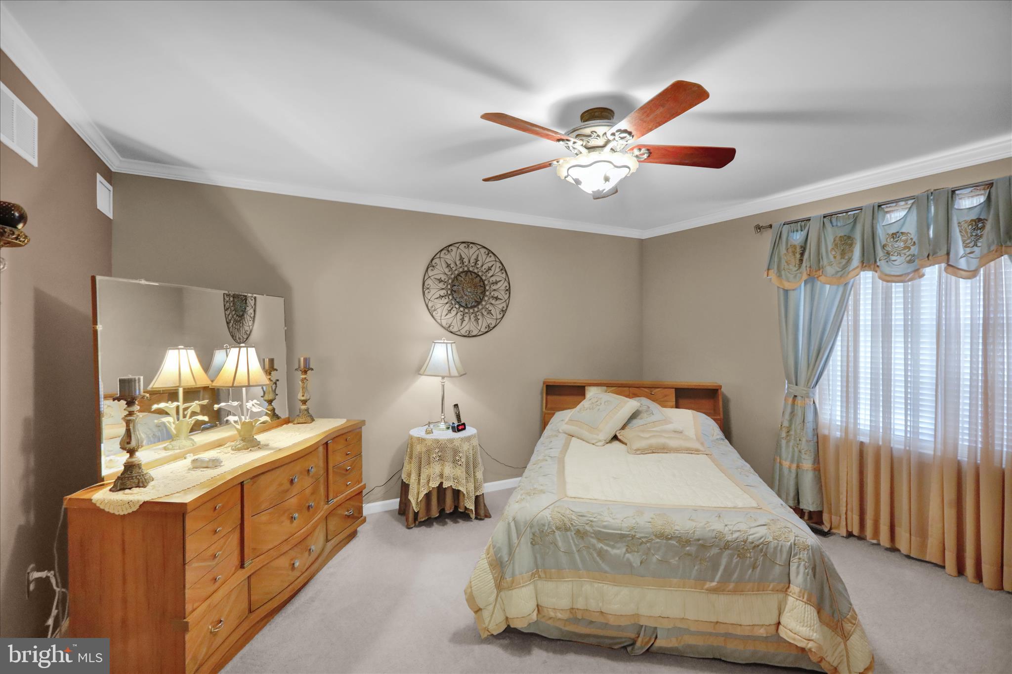 8 Bancroft Terrace Reading, PA 19607 - Photo 20 of 31 a bedroom with a bed and a chandelier