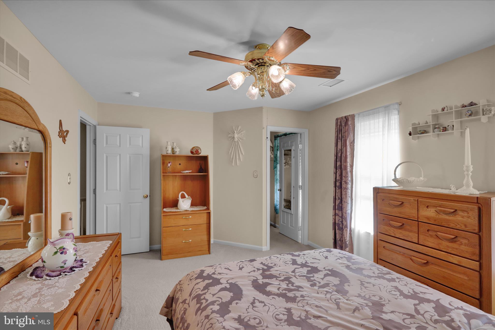 8 Bancroft Terrace Reading, PA 19607 - Photo 23 of 31 a bedroom with a bed and a chandelier