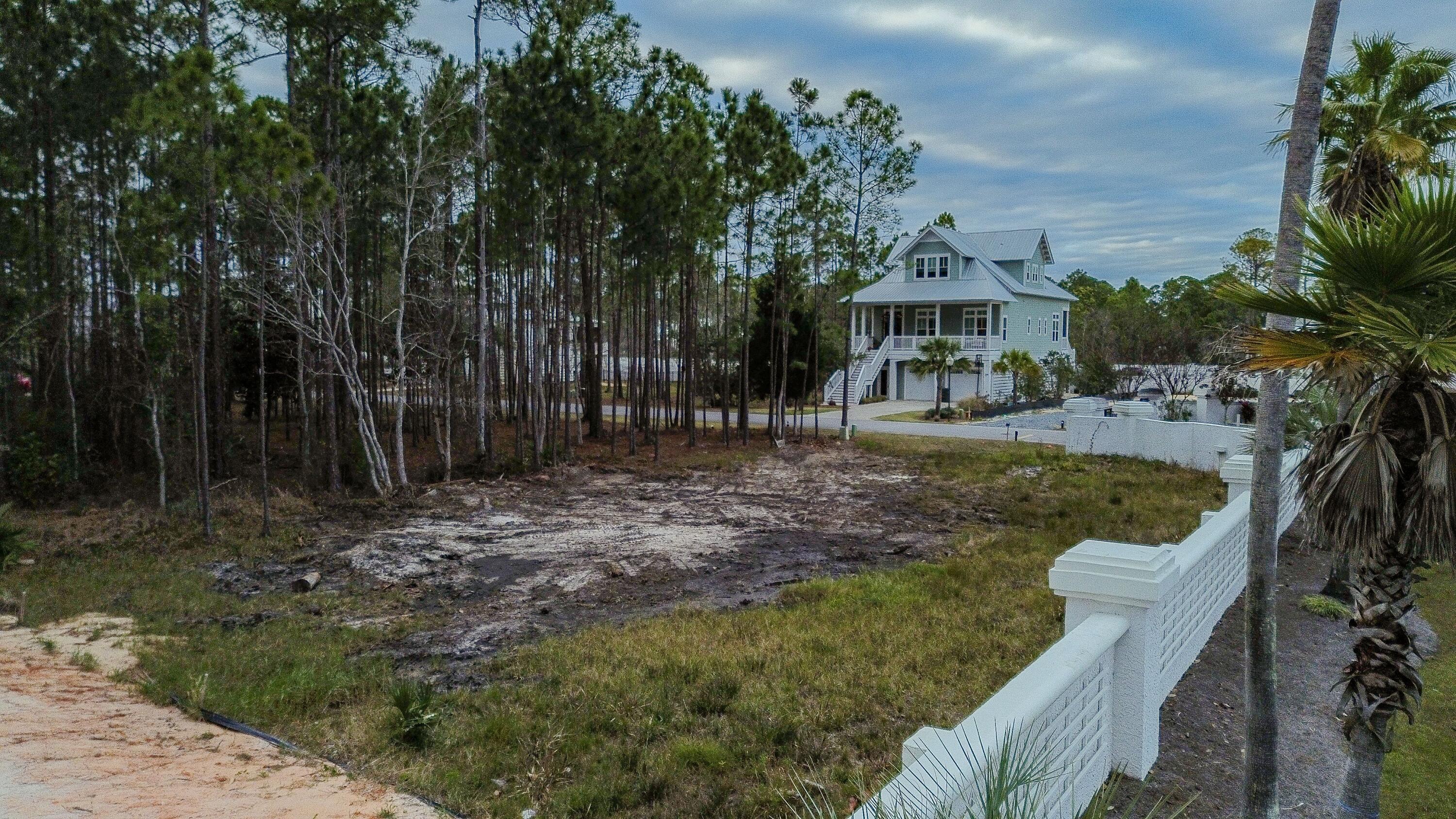 I-14 Mallard Lane Santa Rosa Beach, FL 32459 - Photo 14 of 25 a view of a house with a yard