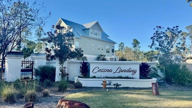 I-14 Mallard Lane Santa Rosa Beach, FL 32459 - Photo 20 of 25 a view of a house with a yard and sitting area