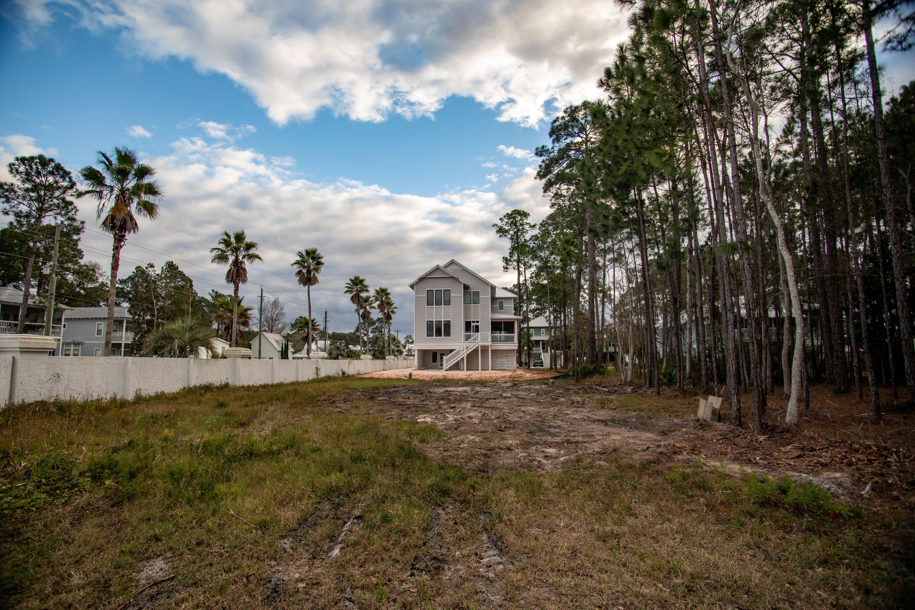I-14 Mallard Lane Santa Rosa Beach, FL 32459 - Photo 2 of 25 a view of a town with palm trees