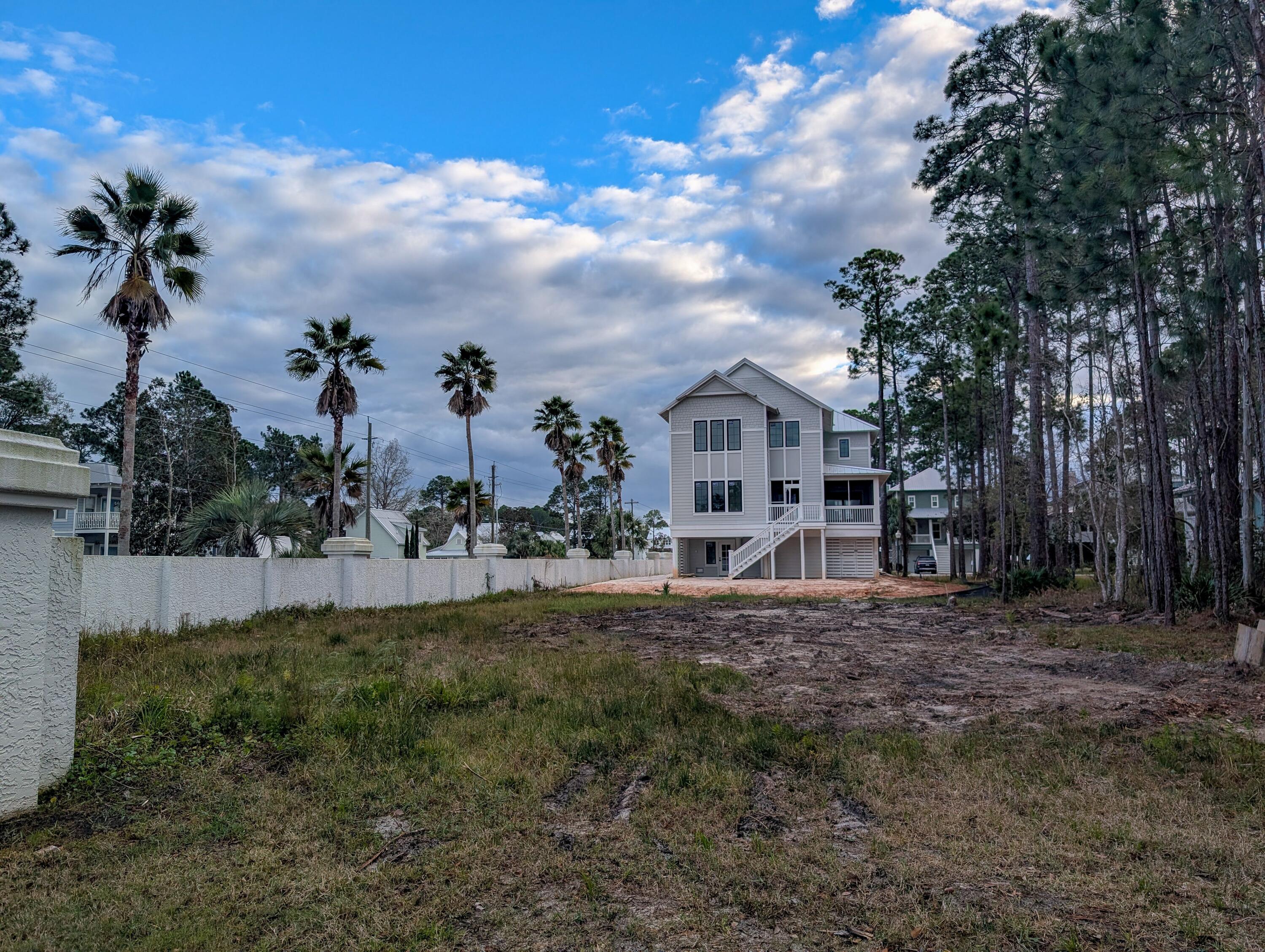 I-14 Mallard Lane Santa Rosa Beach, FL 32459 - Photo 6 of 25 a view of a house with a big yard