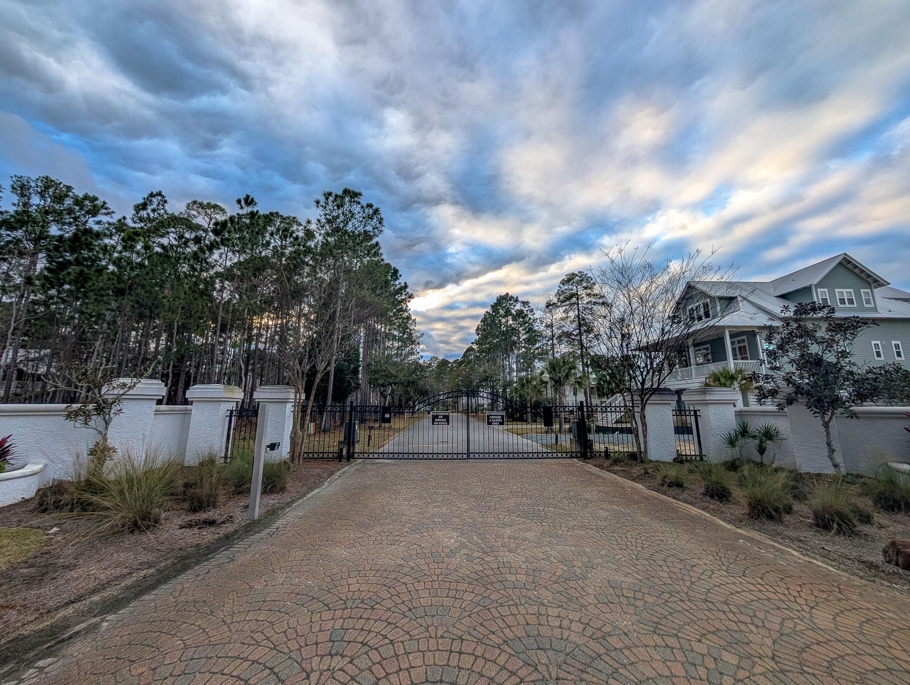 I-14 Mallard Lane Santa Rosa Beach, FL 32459 - Photo 7 of 25 a view of a street with a building in the background