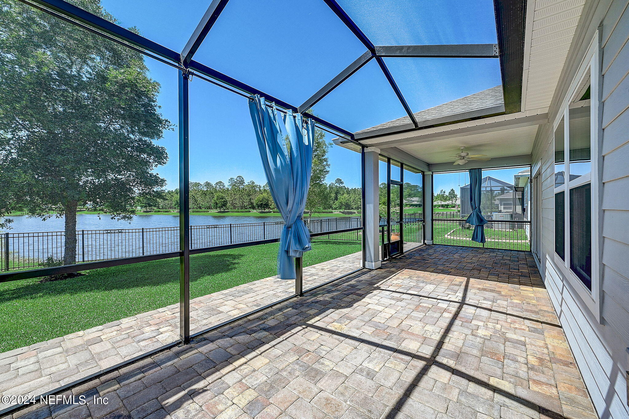 48 Martello Drive St. Augustine, FL 32092 - Photo 12 of 50 a view of porch with a floor to ceiling windows with wooden floor