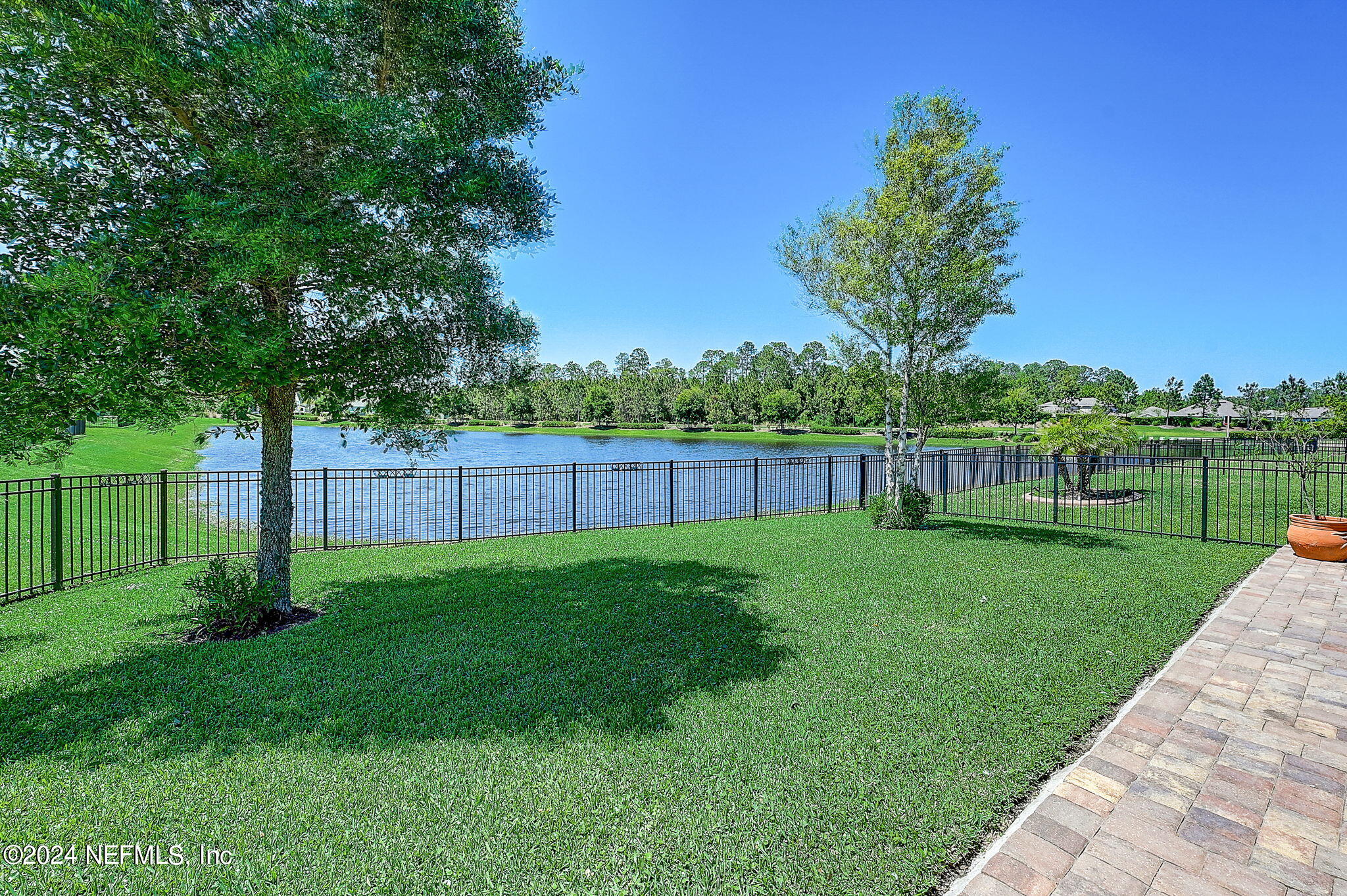 48 Martello Drive St. Augustine, FL 32092 - Photo 13 of 50 a view of a yard with a tree