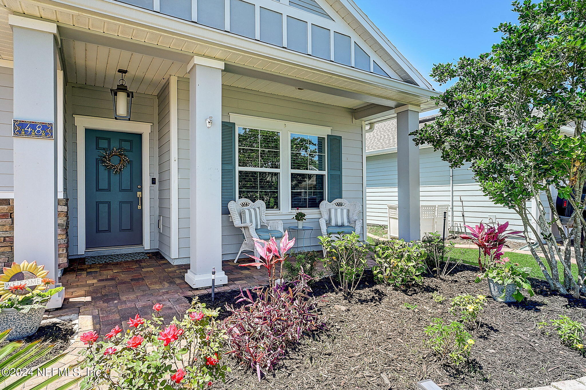 48 Martello Drive St. Augustine, FL 32092 - Photo 2 of 50 a front view of a house with a yard