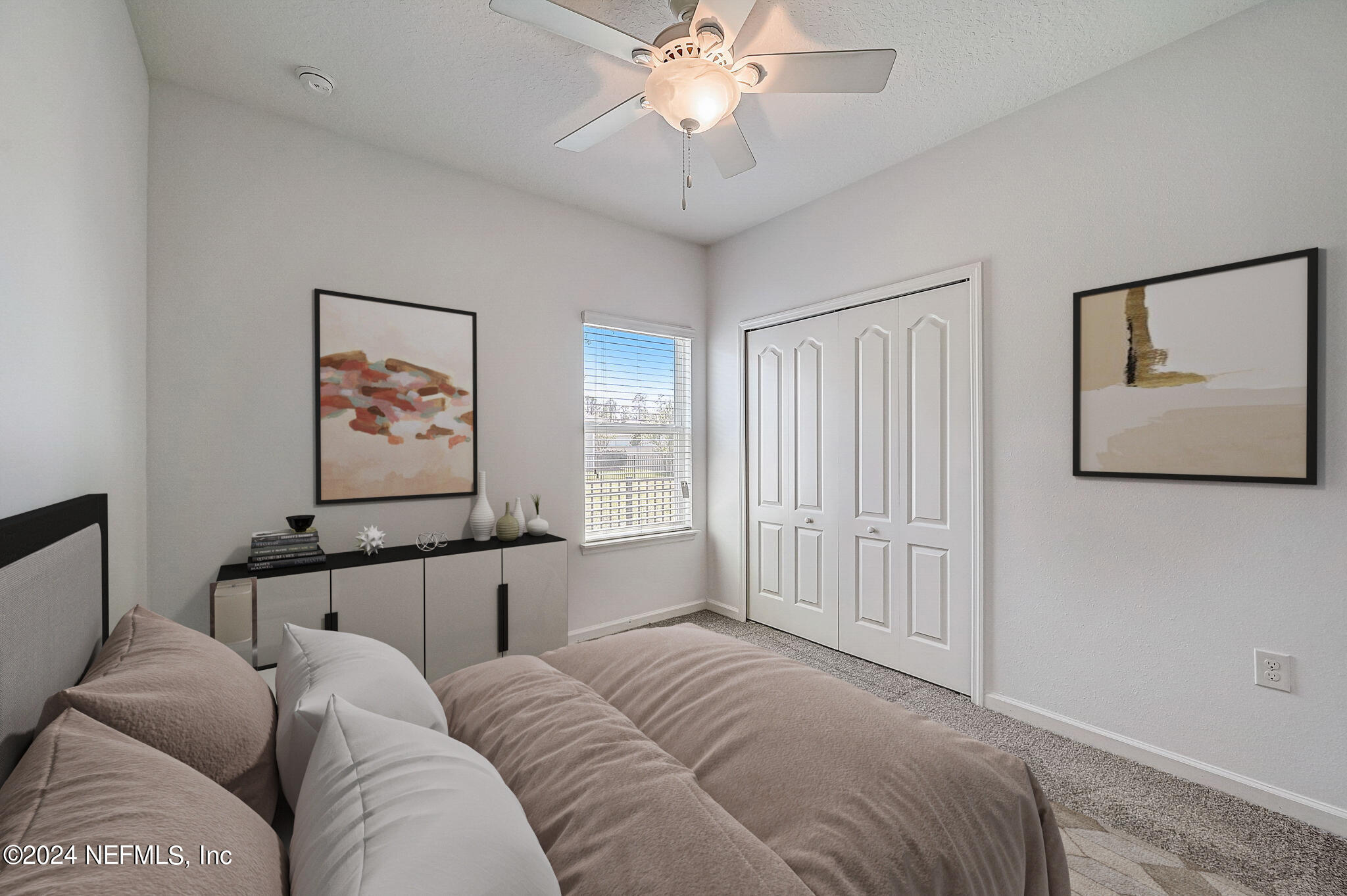 48 Martello Drive St. Augustine, FL 32092 - Photo 23 of 50 a bedroom with furniture and a chandelier