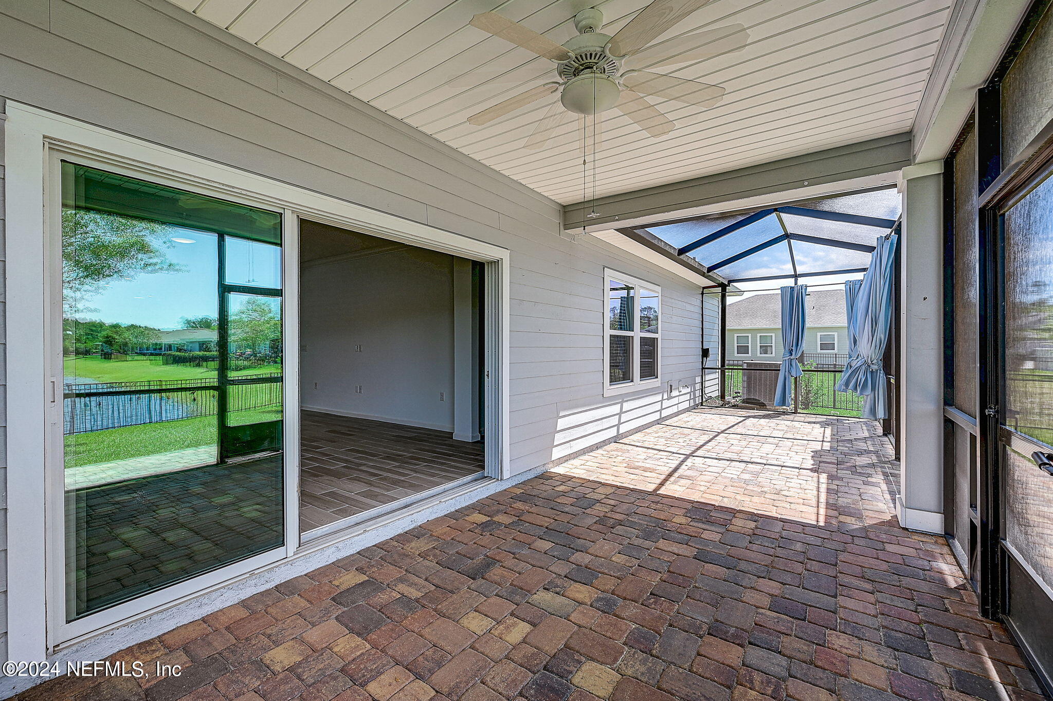 48 Martello Drive St. Augustine, FL 32092 - Photo 28 of 50 a view of porch with wooden floor and outer view