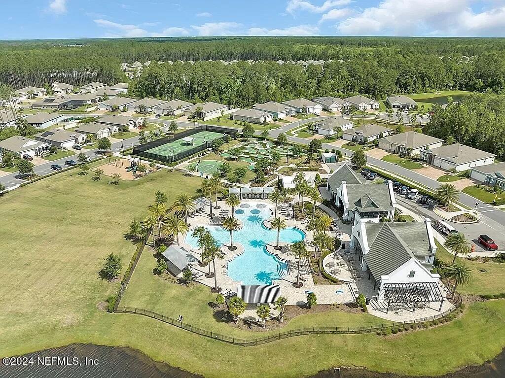 48 Martello Drive St. Augustine, FL 32092 - Photo 43 of 50 a view of a swimming pool with a yard