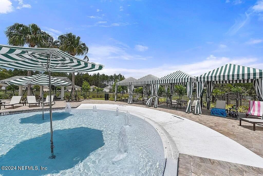 48 Martello Drive St. Augustine, FL 32092 - Photo 46 of 50 a view of a large building in front of a house