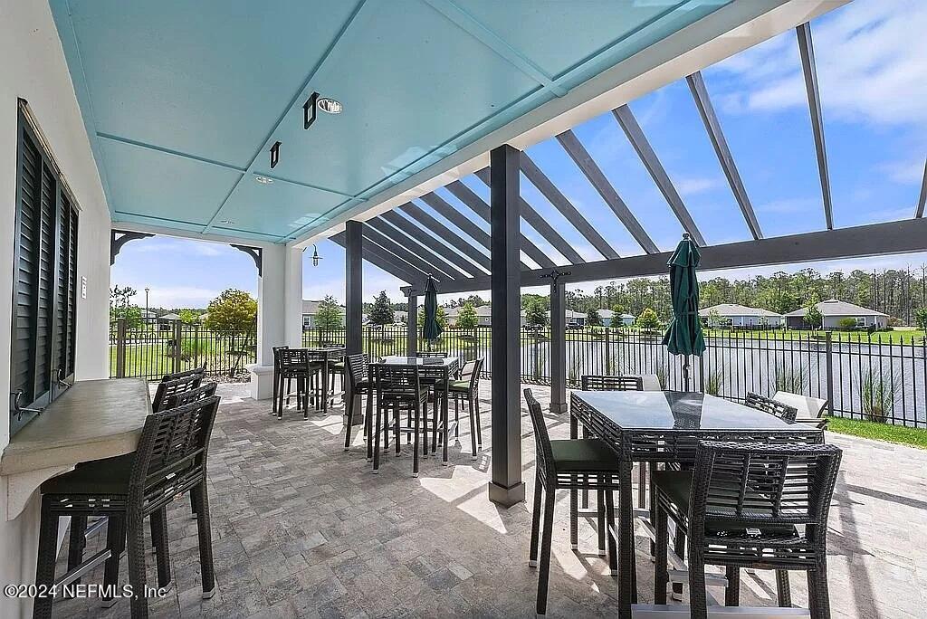 48 Martello Drive St. Augustine, FL 32092 - Photo 50 of 50 a view of a dining area with furniture window and outside view