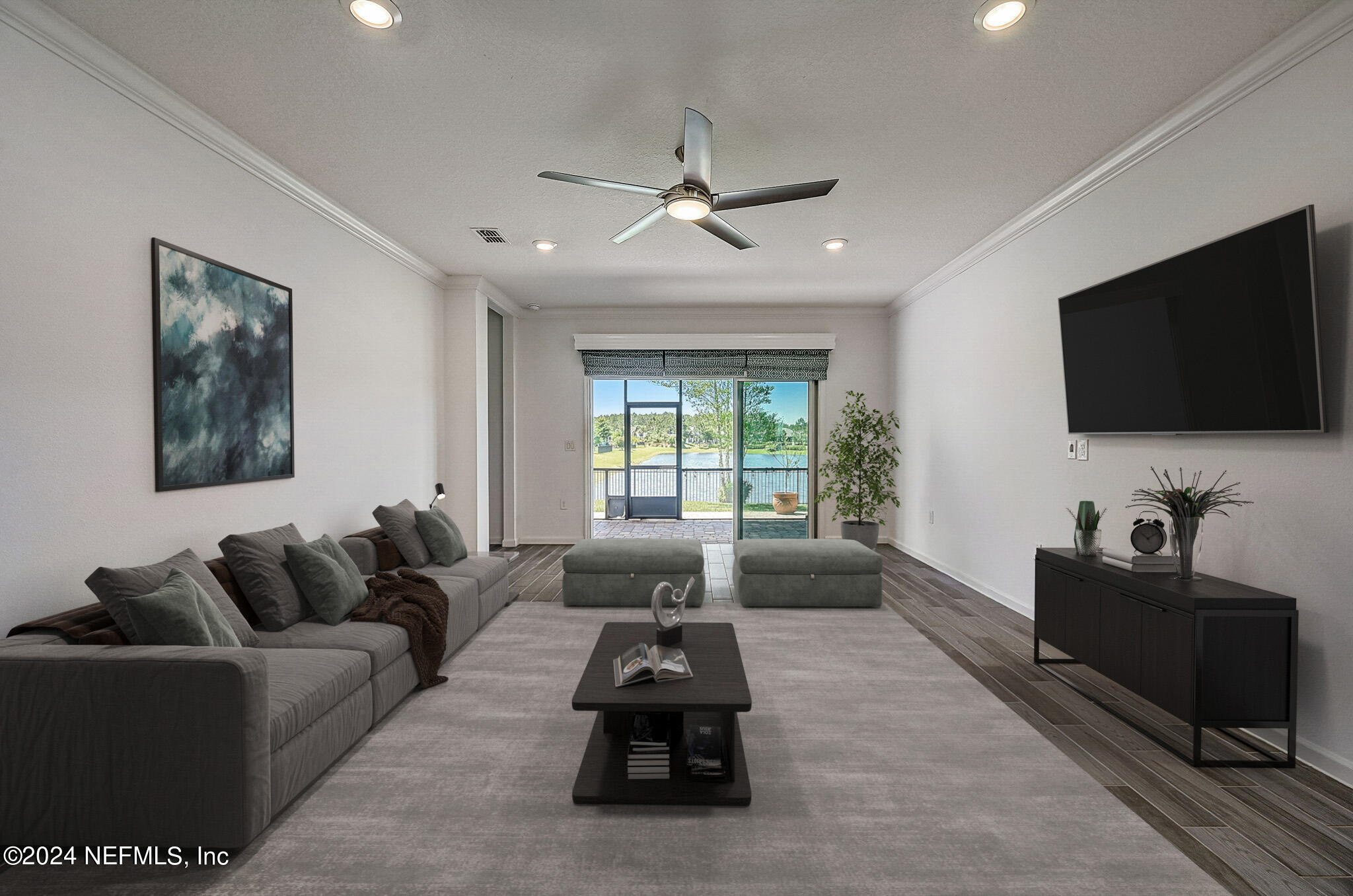 48 Martello Drive St. Augustine, FL 32092 - Photo 9 of 50 a living room with furniture and a flat screen tv