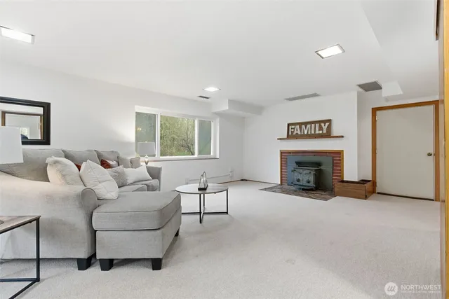 a view of balcony with wooden floor and fence