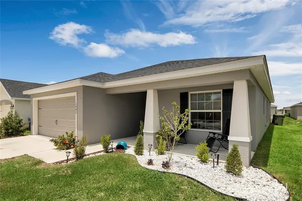 a front view of house with yard