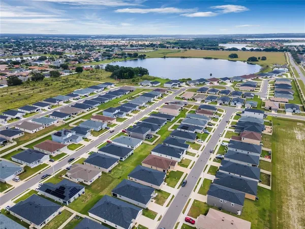 a view of city with ocean