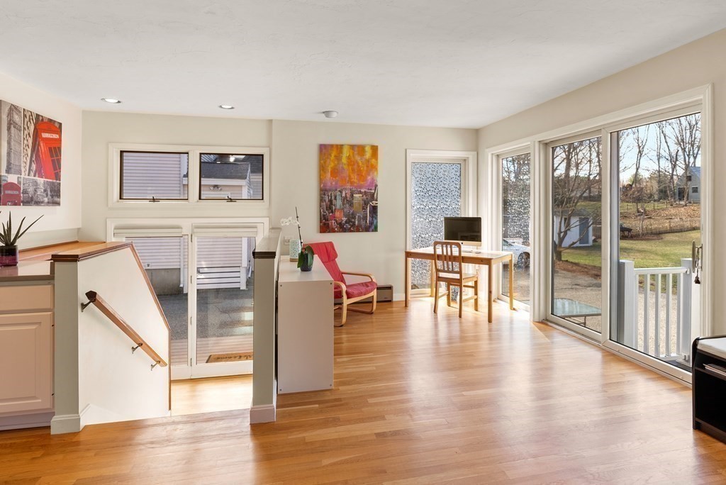 46 Downing Road Lexington, MA 02421 - Photo 13 of 29 a living room with furniture and wooden floor