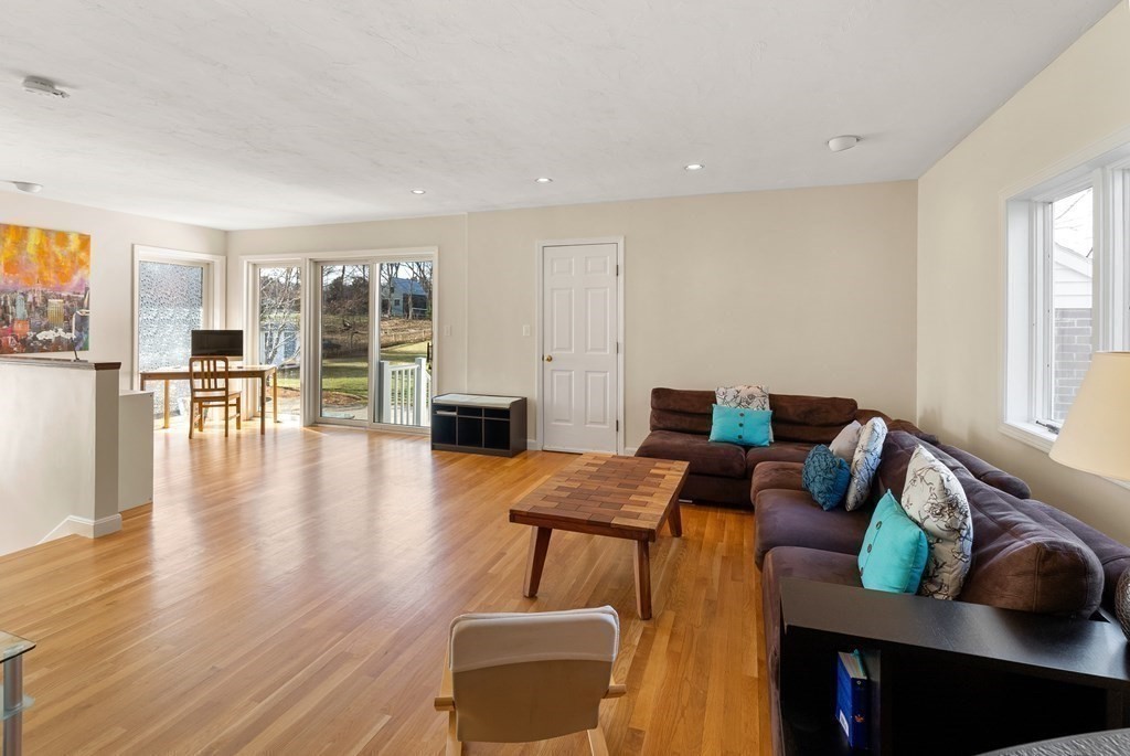 46 Downing Road Lexington, MA 02421 - Photo 14 of 29 a living room with furniture and wooden floor