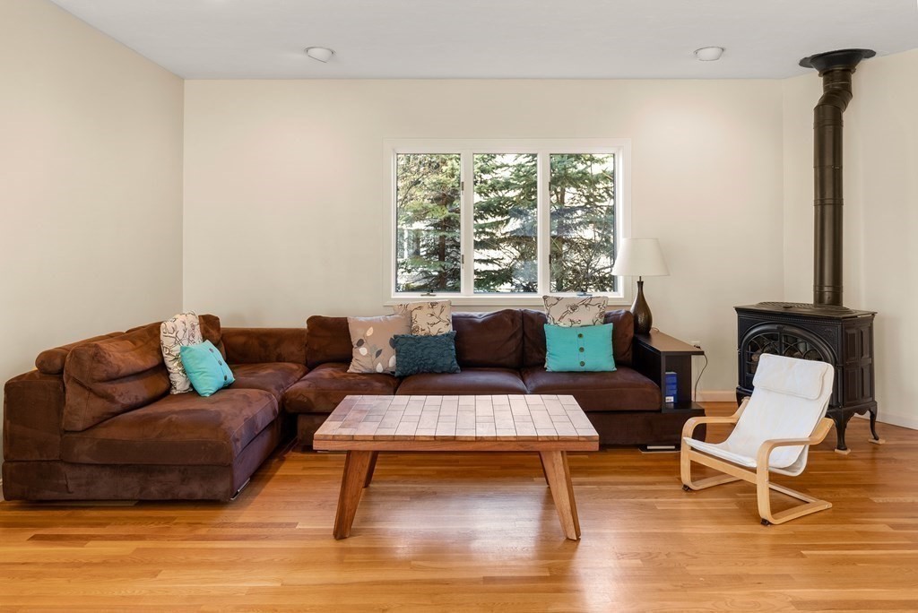 46 Downing Road Lexington, MA 02421 - Photo 15 of 29 a living room with furniture and a large window