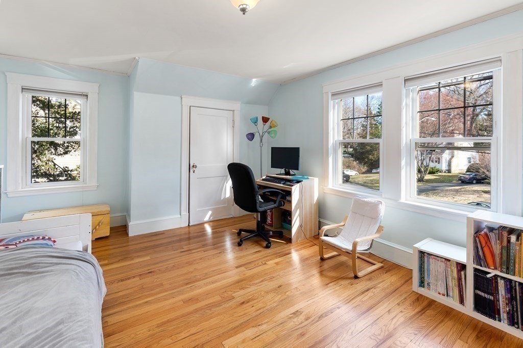 46 Downing Road Lexington, MA 02421 - Photo 18 of 29 a view of a workspace with furniture and a window